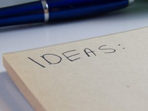 ideas written on a notepad