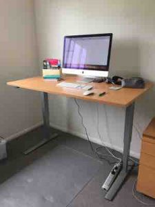 Sit stand desk in office
