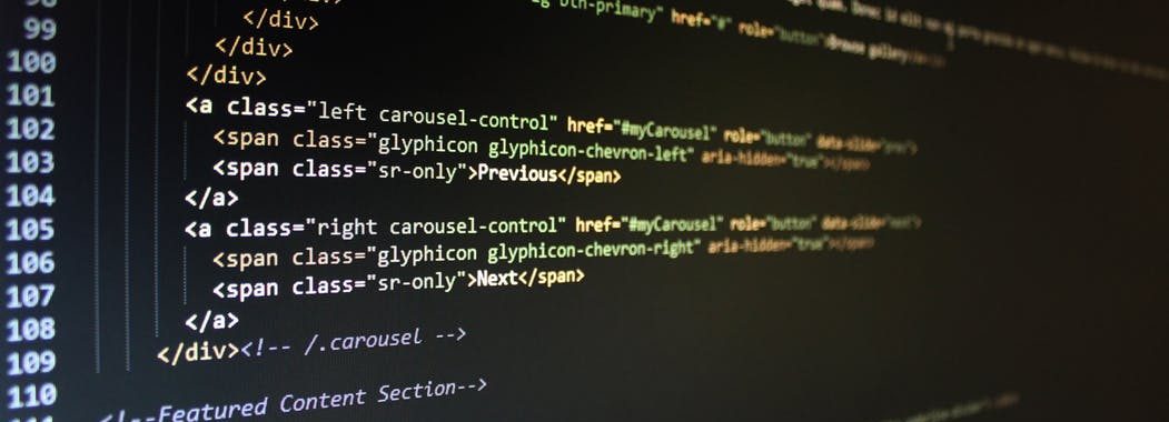 Image shows a screen displaying html code