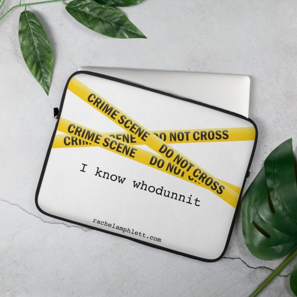 Laptop cover with yellow crime scene tape and text I know whodunnit