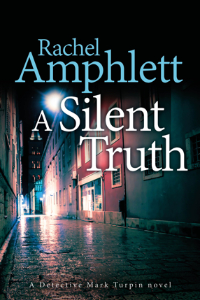 Cover shows a narrow English cobblestoned alleyway in the rain at night