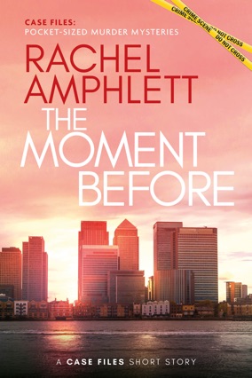 A view across the River Thames towards Canary Wharf, London with a pink-tinged sunrise